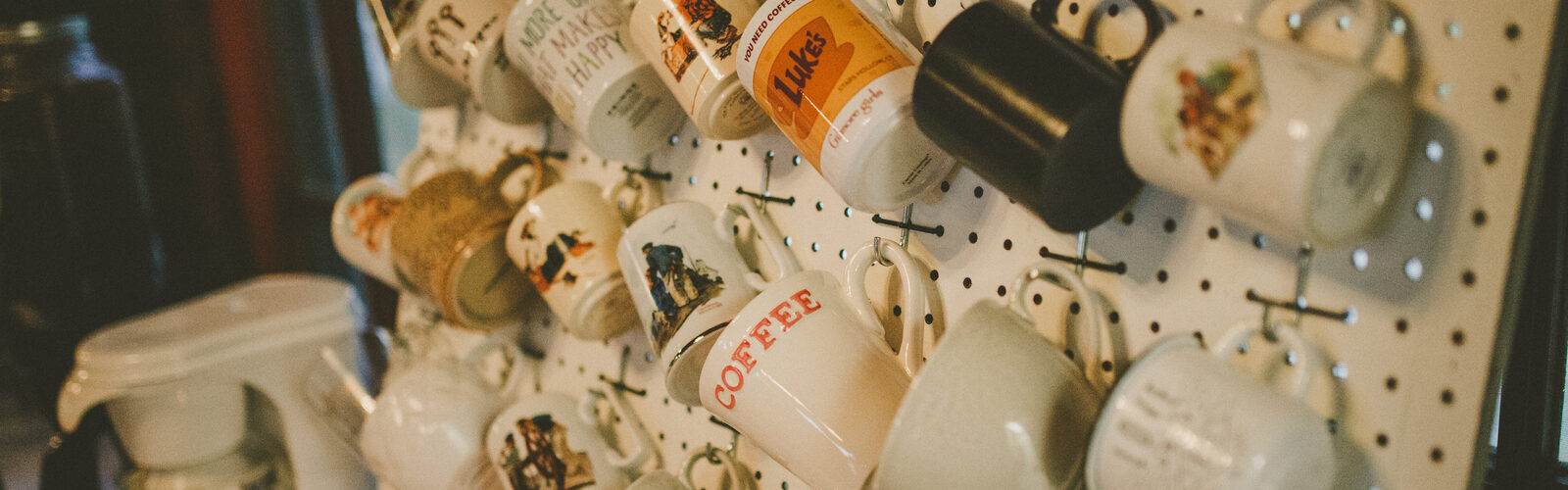 Wall of coffee mugs for after-class lattes